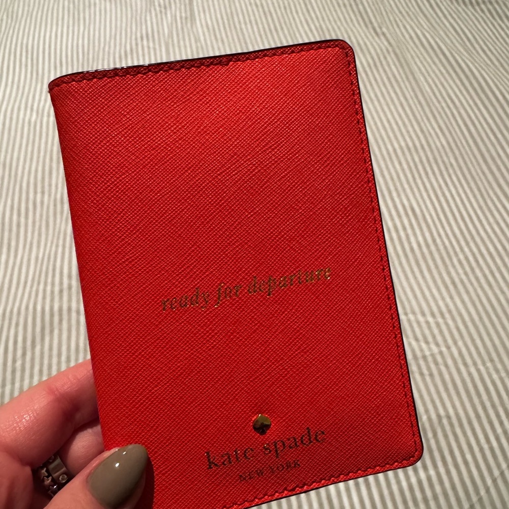 Kate Spade Coral “ready for departure” passport holder